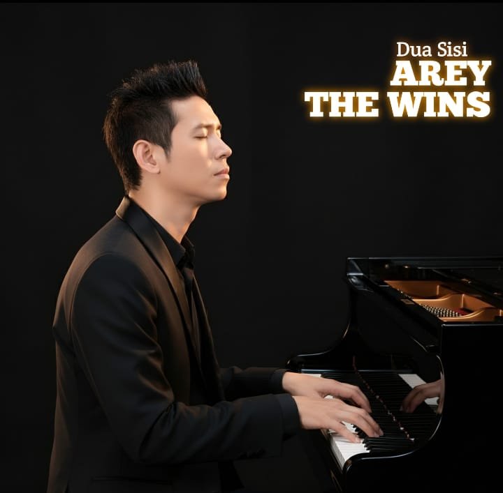 Arey The Wins, musisi sekaligus vokalis dari The Wins Band, resmi merilis karya terbarunya berjudul “Dua Sisi”