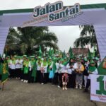 Ribuan peserta mengikuti kegiatan jalan santai kebangsaan dalam rangka 100 Tahun Masehi Lahirnya Nahdlatul Ulama. FOTO: Allung06/portalbmi.id