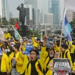 ILUSTRASI sejumlah mahasiswa menggelar aksi demo berjalan kaki menuju Bundaran Hotel Indonesia, Jakarta, Jumat (12/6/2026).